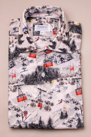 Folded needle corduroy shirt with ski resort pattern on a beige background
