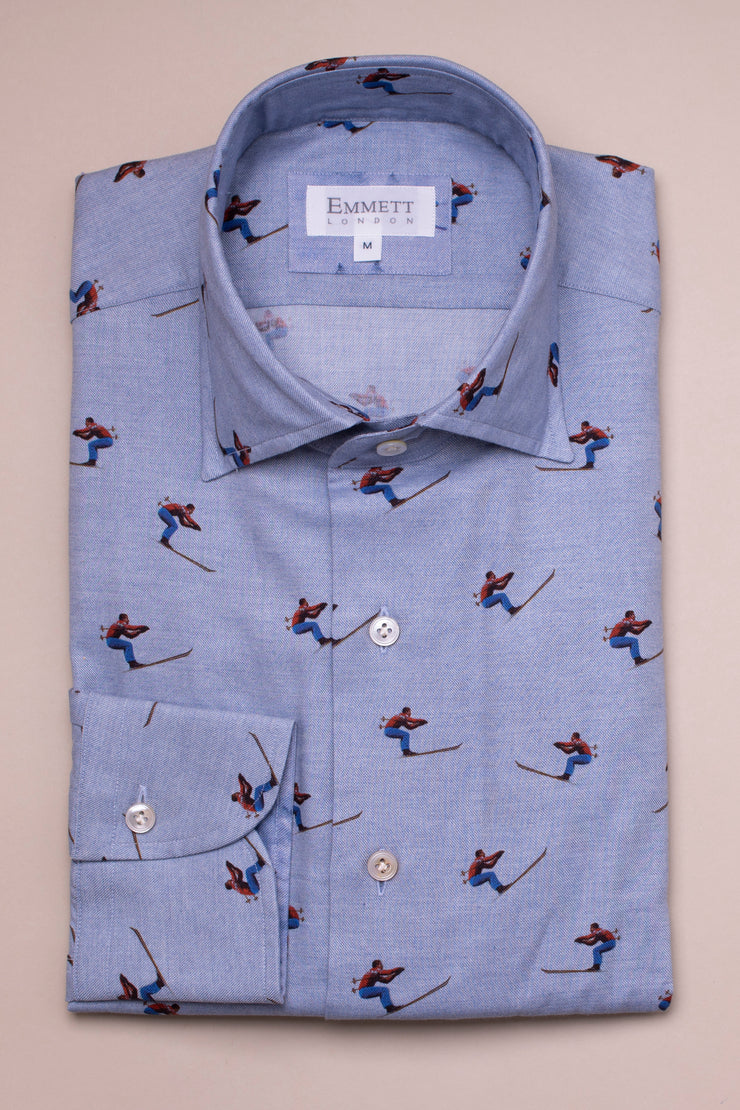 Race Skiers on Light Blue Shirt