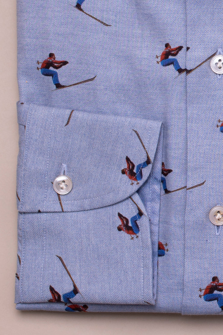 Race Skiers on Light Blue Shirt